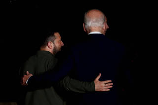 FILE PHOTO: U.S. President Joe Biden and Ukrainian President Volodymyr Zelenskiy in Fasano, Italy