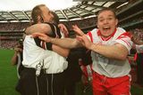 thumbnail: Tyrone manager Mickey Harte and Paddy Tally hug after the 2003 All-Ireland SFC win as Tyrone's Peter Loughran (right) celebrates.