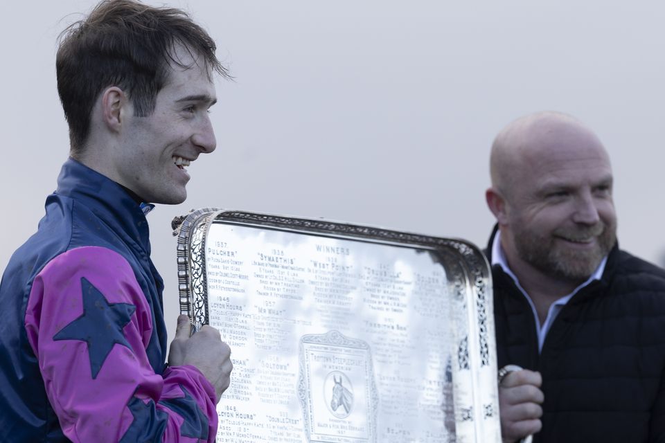 Gavin Brouder and owner Francis Foran with the trophy for the Bar One Racing Troytown Handicap Chase following the success of the Gordon Elliott-trained Stuzzikini at Navan on Sunday. Photo by Patrick McCann/Racing Post