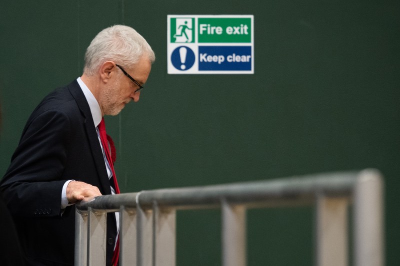 Labour Party leader Jeremy Corbyn leaves the stage at Sobell leisure centre after retaining his parliamentary seat in London on Dec. 13.