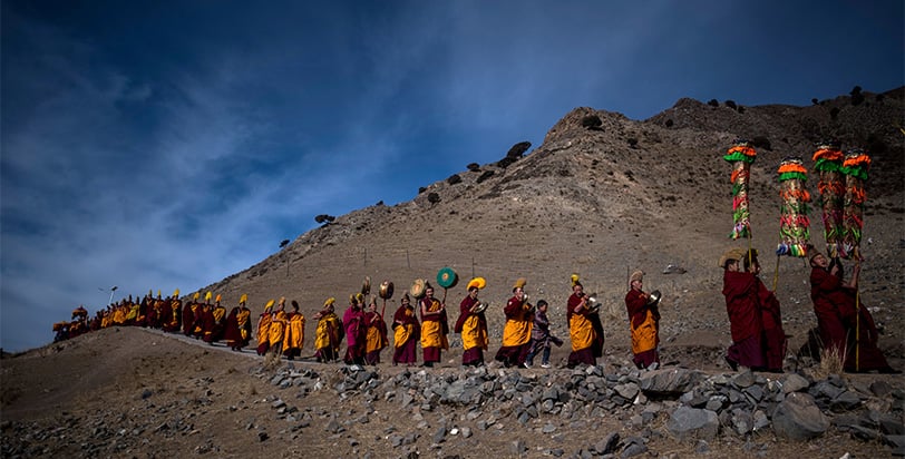 Tibetan Buddhist monks walking