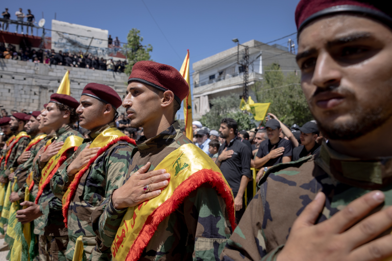 Hezbollah members attend the funerals of fellow fighters in Aita al-Chaab, Lebanon.