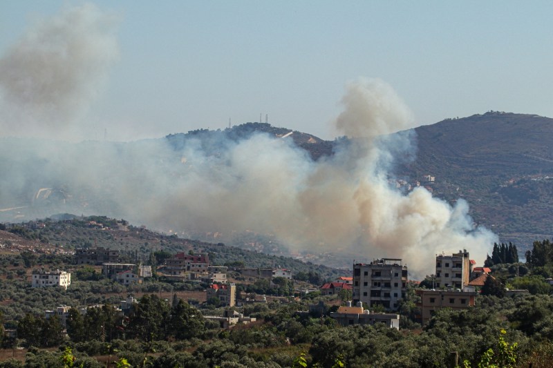 Smoke billows from a site targeted by the Israeli military in the southern Lebanese border village of Kafr Kila on July 29.