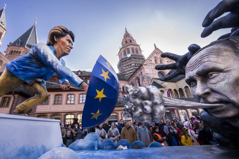 A satirical float shows European Commission President Ursula von der Leyen and Russian President Vladimir Putin during the annual carnival parade in Mainz, Germany, on Feb. 20, 2023.