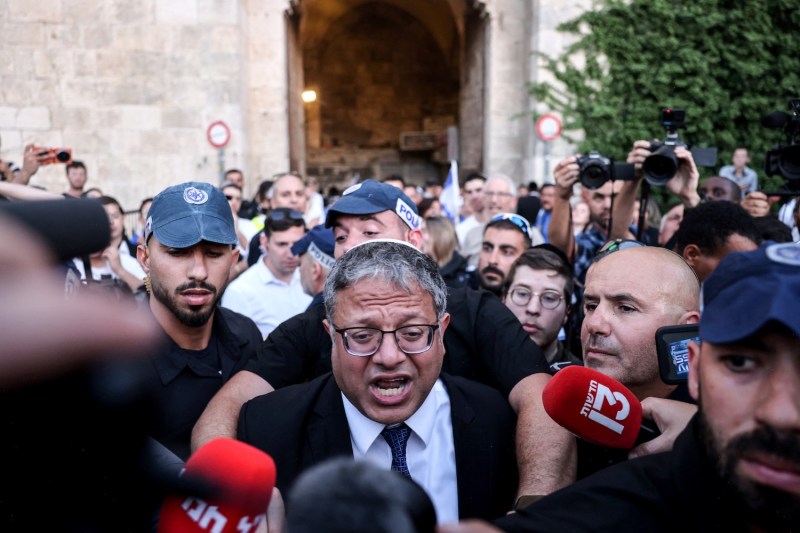 Israeli National Security Minister Itamar Ben-Gvir speaks to the press as he joins Jewish nationalists, including far-right activists, rallying at Jerusalem's Damascus Gate.