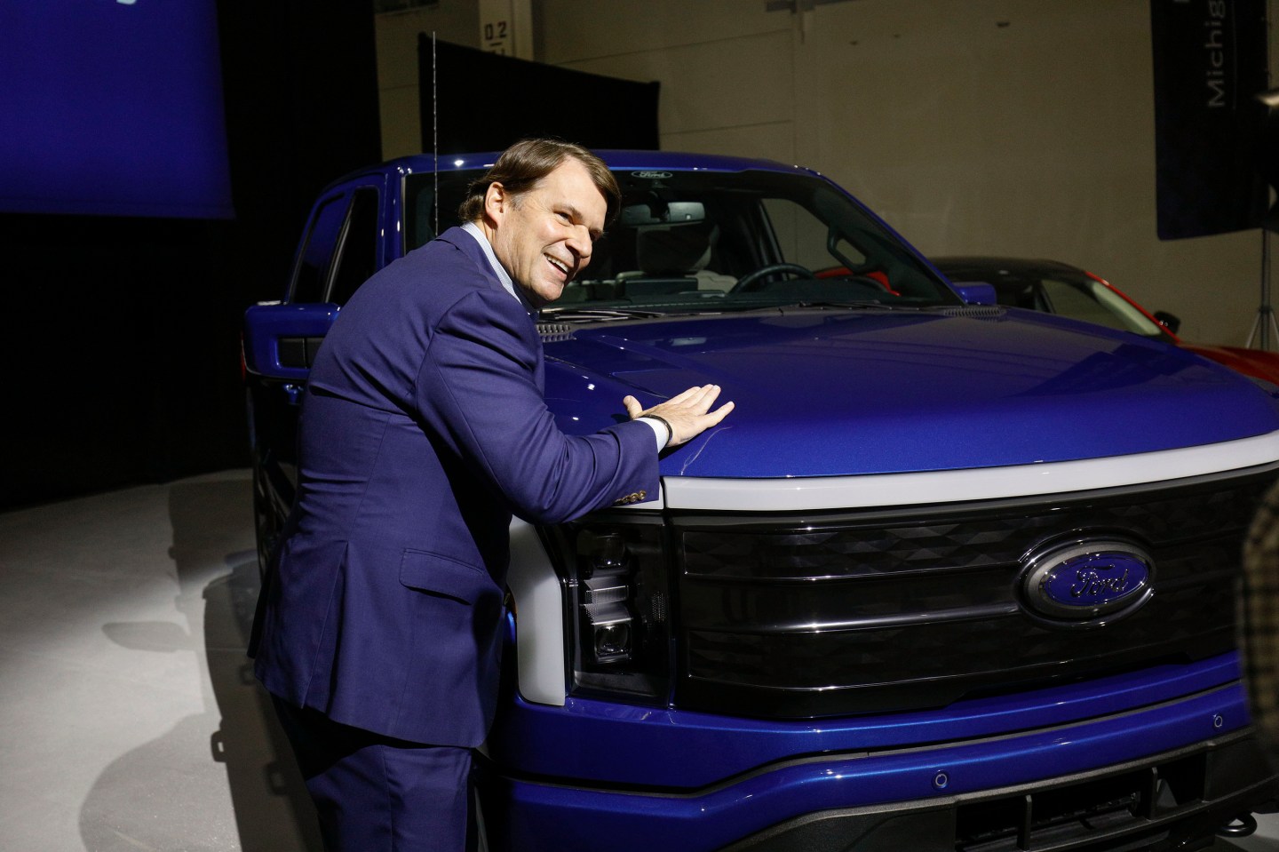 ROMULUS, MI &#8211; FEBRUARY 13: Ford CEO Jim Farley pats a Ford F-150 Lightning truck before announcing at a press conference that Ford Motor Company will be partnering with the world&#8217;s largest battery company, a China-based company called Contemporary Amperex Technology,  to create an electric-vehicle battery plant in Marshall, Michigan, on February 13, 2023 in Romulus, Michigan. Part of a multi-billion dollar investment, the battery plant will provide approximately 2,500 jobs. (Photo by Bill Pugliano/Getty Images)