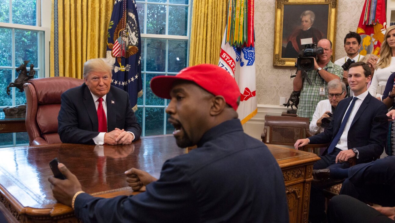 Then-President Donald Trump met with Kanye West in the Oval Office of the White House, Oct. 11, 2018. (Calla Kessler/The Washington Post via Getty Images)