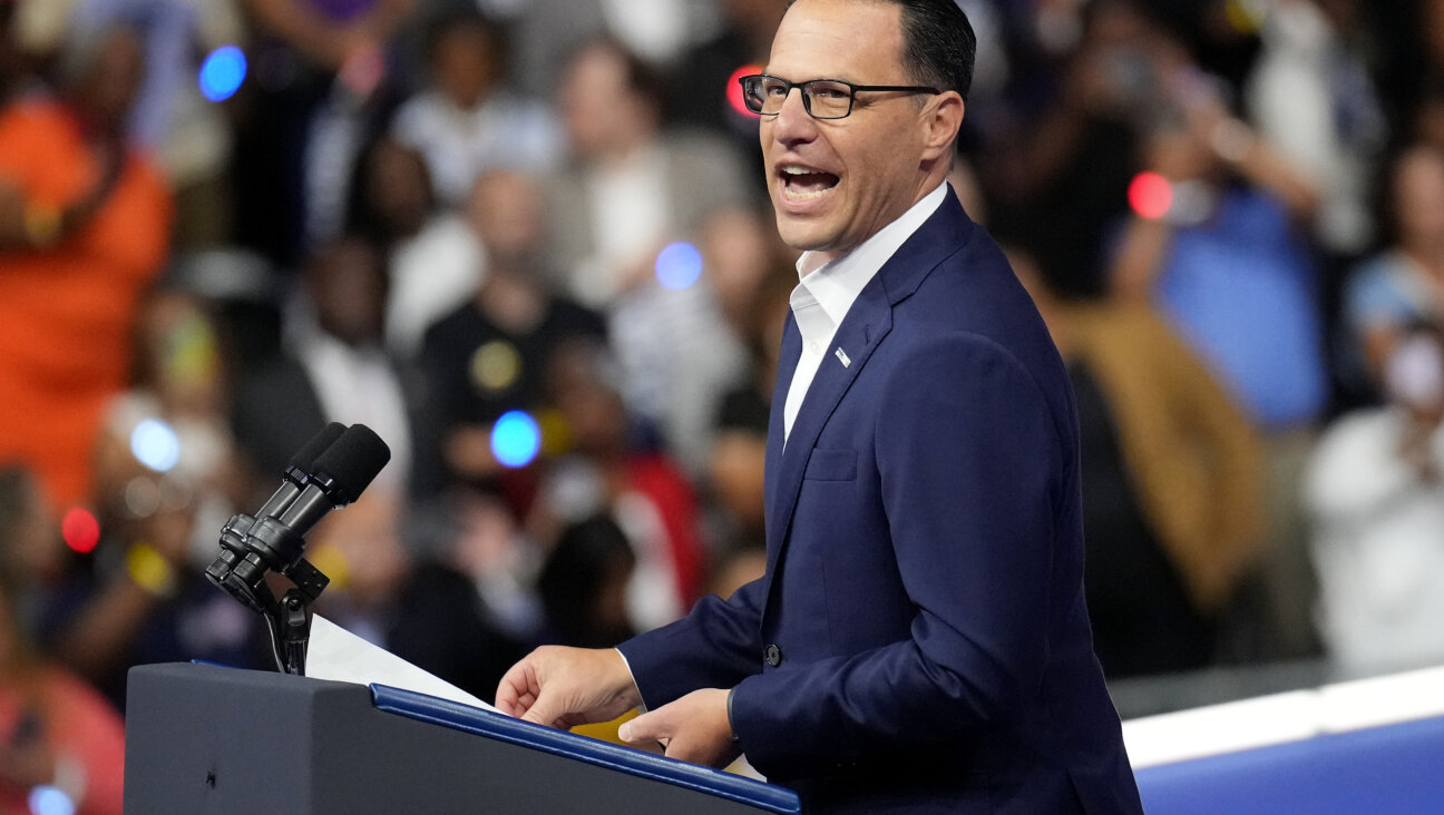 Pennsylvania Gov. Josh Shapiro greets the crowd before the start of a campaign rally with Democratic presidential candidate, U.S. Vice President Kamala Harris and Democratic vice presidential candidate Minnesota Gov. Tim Walz on Aug. 6, 2024 in Philadelphia, Pennsylvania. 