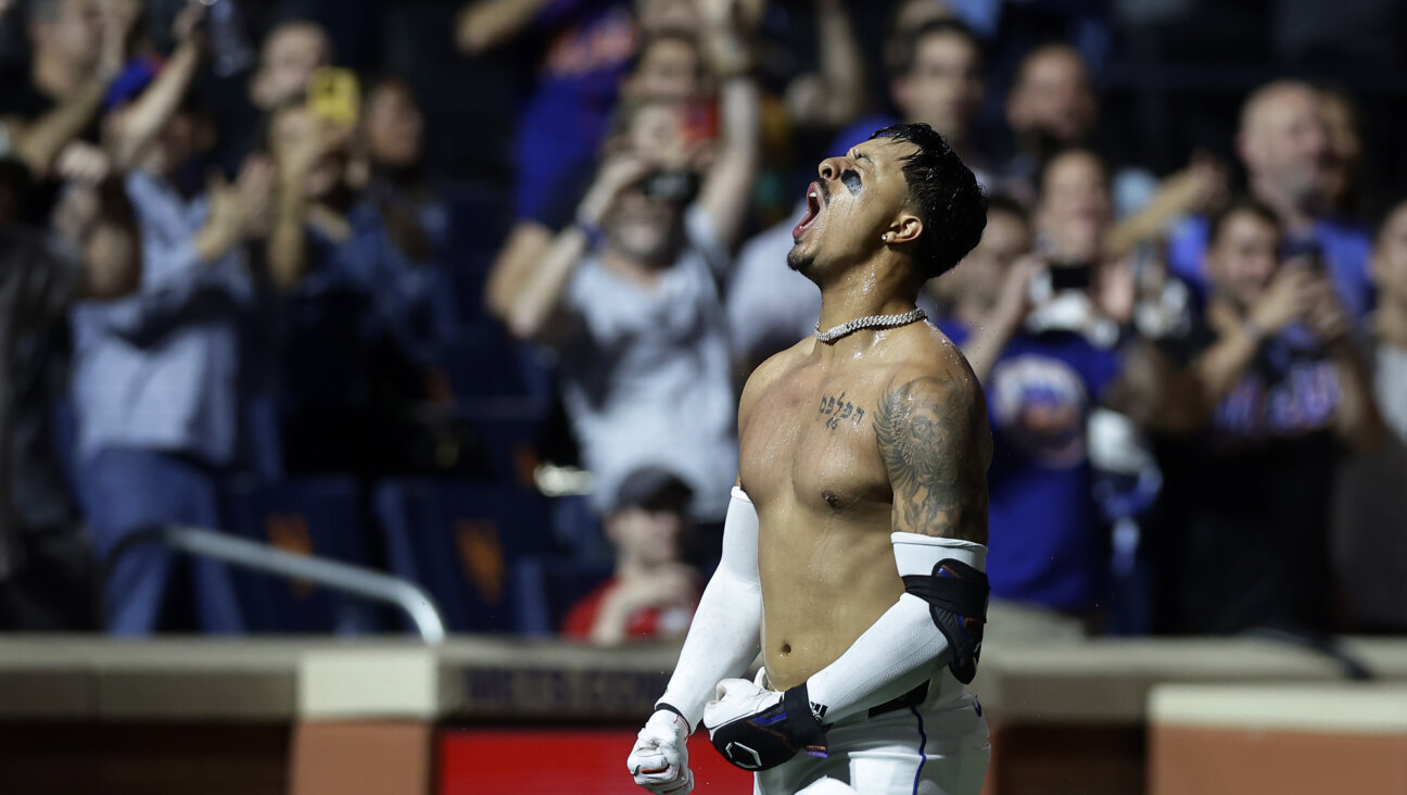 Mark Vientos of the New York Mets celebrates his game winning two-run home run.