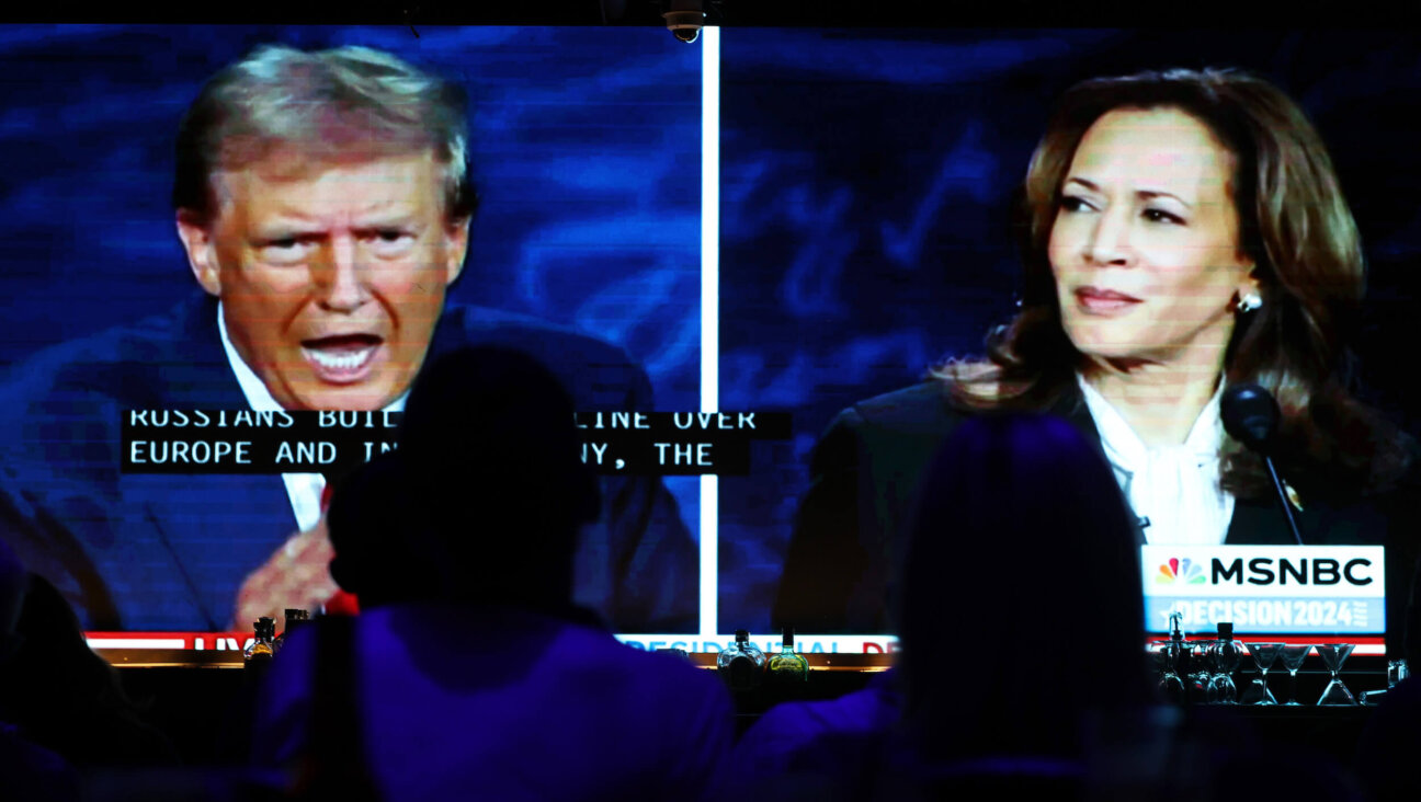 People watch the ABC News presidential debate between Democratic presidential nominee, Vice President Kamala Harris, and Republican presidential nominee, former President Donald Trump. 