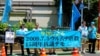 2024年7月5日，日本维吾尔协会在东京中国驻日本大使馆门外请愿。(日本维吾尔协会副会长萨吾提·穆罕默德提供照片)