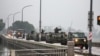 在中国军队举行绕台军演之际，台湾军车驶过金门岛街头。 (2024年5月24日)