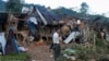 资料照片: 2023年10月10日被缅甸军队摧毁的房屋