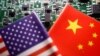 (FILE) Illustration picture of Chinese and U.S. flags with semiconductor chips.