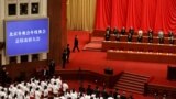 中国国家主席习近平抵达在北京中国人民大会堂举行的北京冬奥会残奥会总结表彰大会会场。(2022年4月8日)