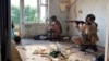 (FILE) In this photo released by Russian Defense Ministry Press Service on Thursday, Oct. 17, 2024, Russian soldiers signalmen are seen in an apartment building on an undisclosed location in Ukraine.