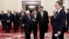 中国国家主席习近平与美国前国务卿基辛格步入北京人大会堂出席2019创新经济论坛。 （2019年11月22日）