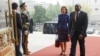 Britain's Foreign Secretary David Lammy (R) and British Ambassador to China Caroline Wilson arrive to the Great Hall of the People in Beijing on October 18, 2024. (Photo by FLORENCE LO / POOL / AFP)