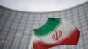 资料照片：国际原子能机构总部大楼外面的伊朗国旗。(2021年12月17日）
