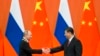 资料照：中国领导人习近平在北京人大会堂会晤到访的俄罗斯总统普京。（2018年6月8日）