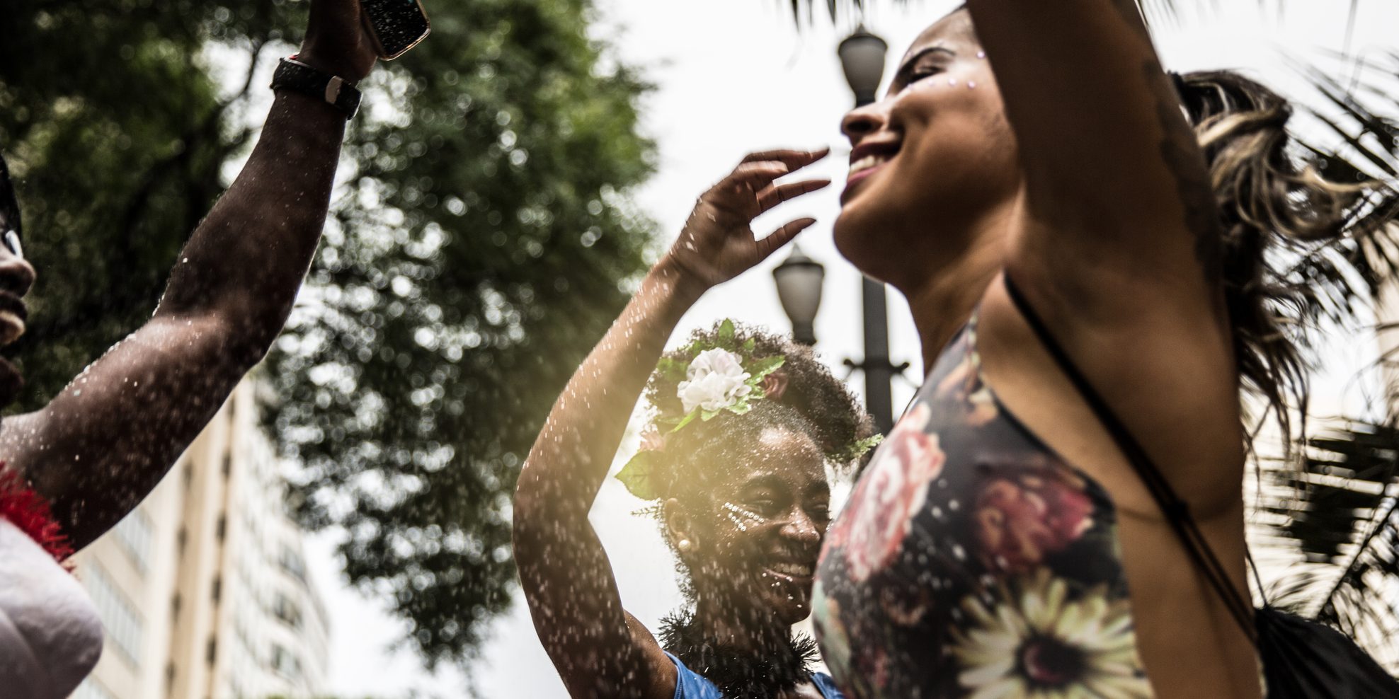 People having fun in the street carnival party