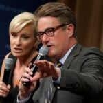 File photo of MSNBC 'Morning Joe' hosts Joe Scarborough (R) and Mika Brzezinski at the National Archives on July 12, 2017 in Washington, DC.