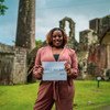 A young woman from St. Kitts and Nevis in the Caribbean completed a UN survey about her hopes and futures for the future.