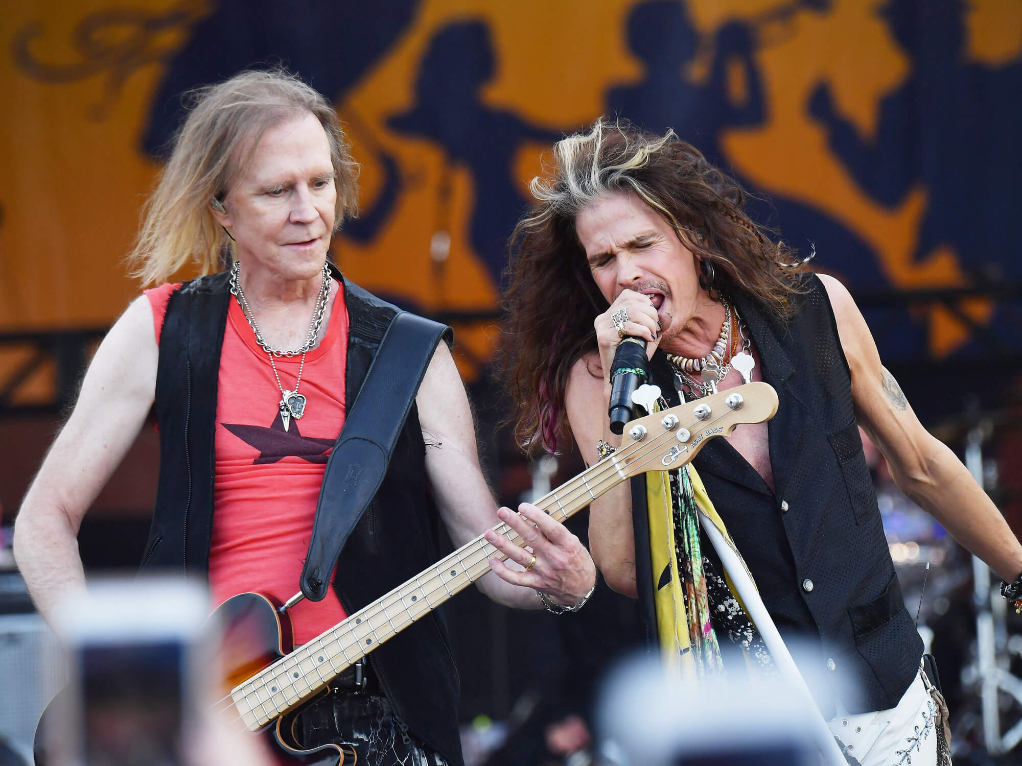 Tom Hamilton (L) and Steven Tyler of Aerosmith