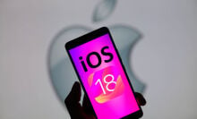 iOS 18 logo on iPhone screen