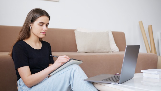 Girl looking at laptop