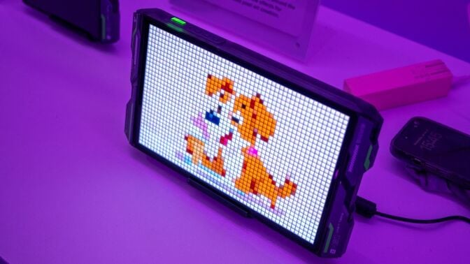 A light panel showing an image of a dog with orange fur. 