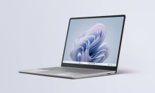 the microsoft surface laptop go 3 against a pale blue background