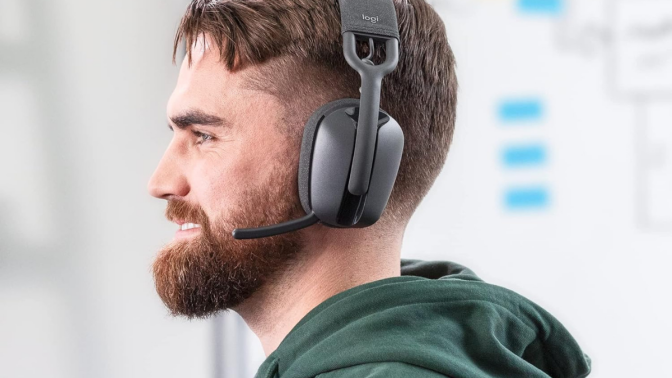 man wearing noise-canceling headphones 