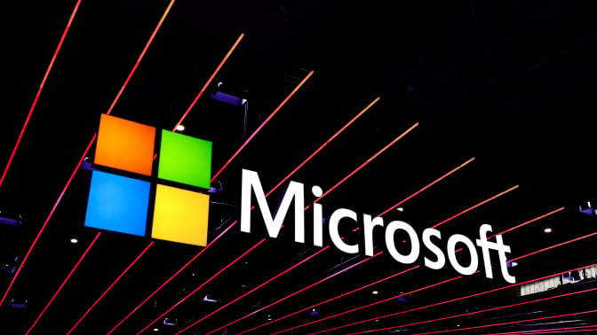 microsoft logo with streaking lights above