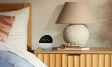 an amazon echo spot on a bedside table