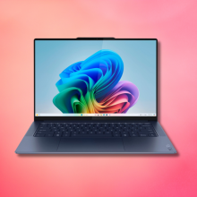Lenovo yoga slim laptop against a pink background 