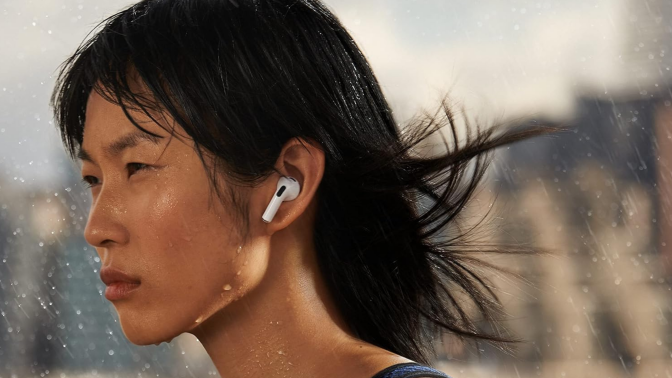 woman wearing apple airpods in the rain 