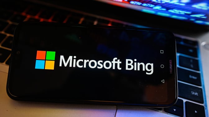 The Microsoft Bing logo on a dark phone screen.