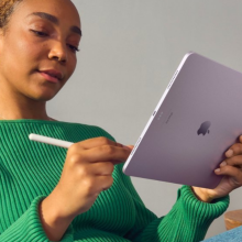 a close-up of a woman writing on an m2 apple ipad air with an apple pencil pro