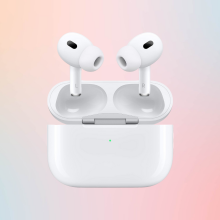 air pods pro against a pink and green background 