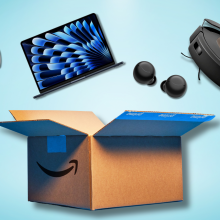 Amazon Prime box with Bose headphones, MacBook Air, Amazon Echo Buds, and Roomba hovering above it