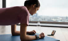 woman in a plank position wearing Samsung Galaxy Watch 6