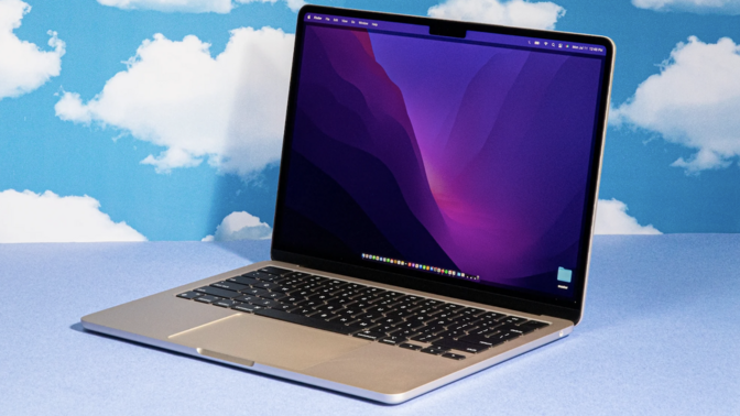 Photo of the Apple MacBook Air (M2) in front of a cloud background