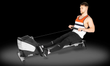 Man on rowing machine