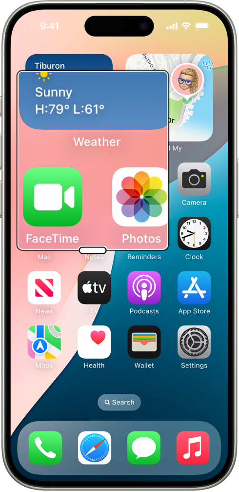 An iPhone showing the Home Screen with a window zoomed in on a part of the screen.