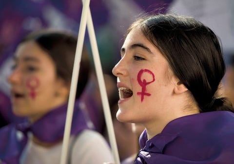 a person with a red mark on the face