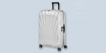 a grey suitcase with wheels