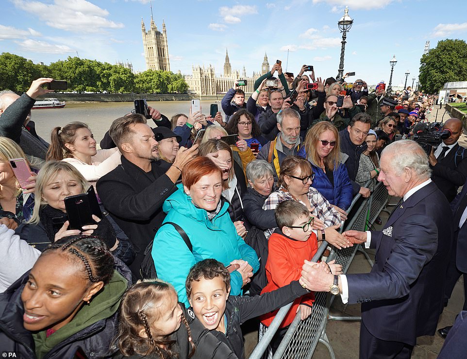 King Charles III meets members of the public in the queue along the South Bank