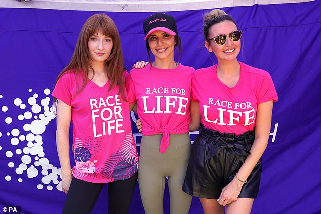 Together again: The members of Girls Aloud reunited in Hyde Park in July for the first time in nine years as they paid tribute to the life of their late bandmate Sarah (Nicola, Cheryl and Nadine pictured)