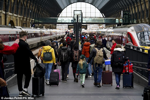 No such disruption at London King's Cross (pictured), where families set off on railway journeys along the East Coast Mainline without issue